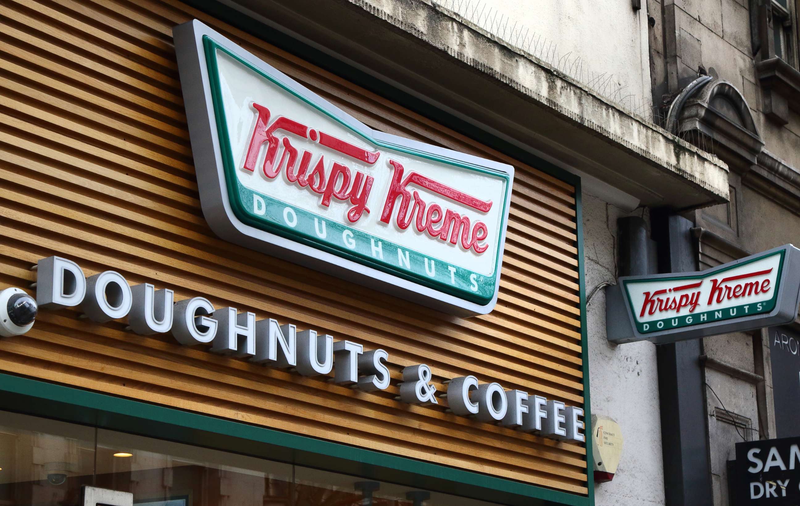 PHOTO: A Krispy Kreme sign hangs on a storefront in London, Jan. 27, 2019.