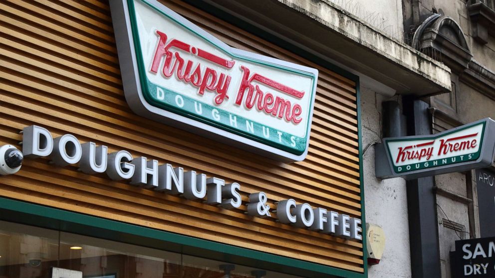 PHOTO: A Krispy Kreme sign hangs on a storefront in London, Jan. 27, 2019.