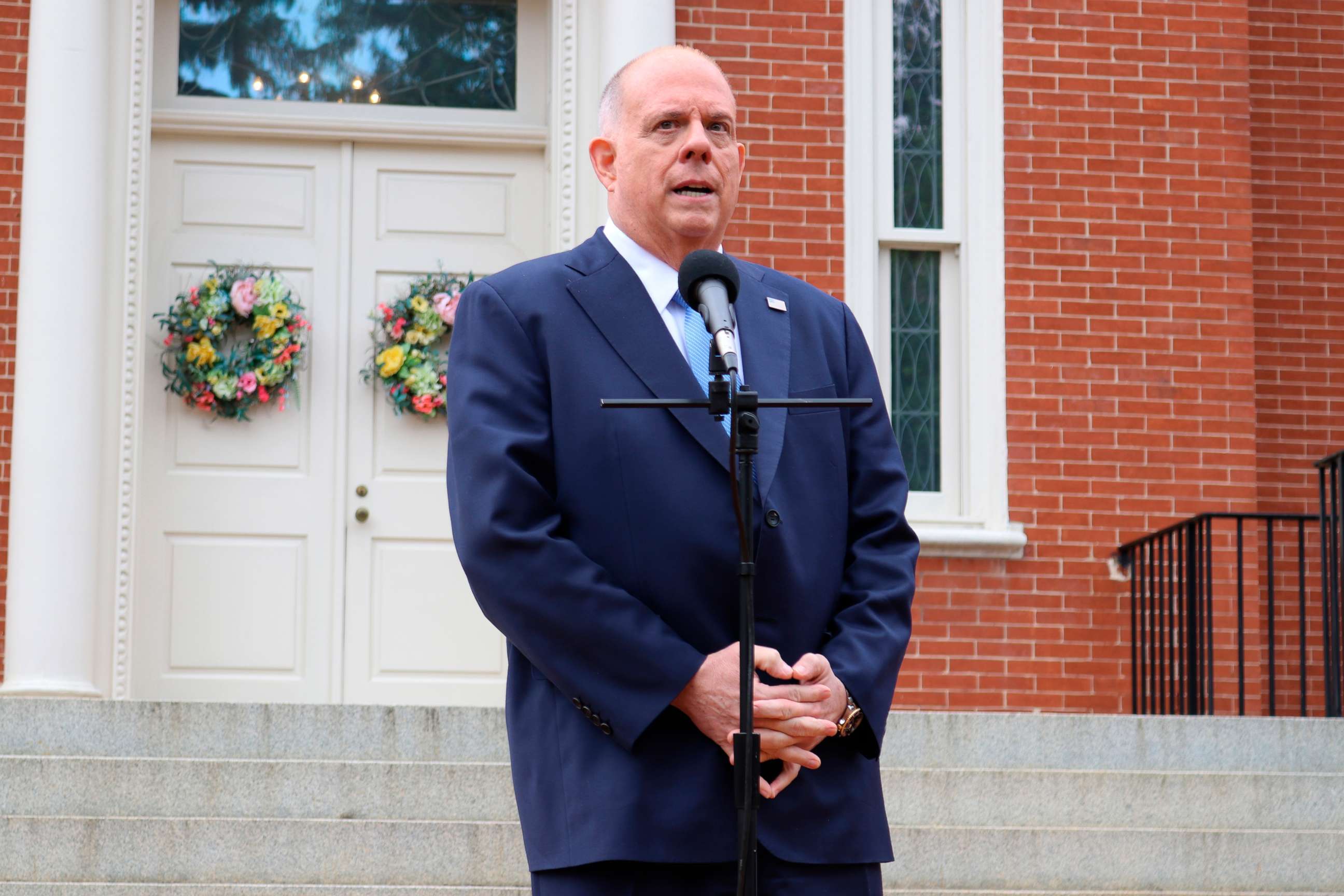 PHOTO: In this April 12, 2021 photo Maryland Gov. Larry Hogan talks to reporters at the governor's residence on the last day of the state's legislative session in Annapolis, Md.