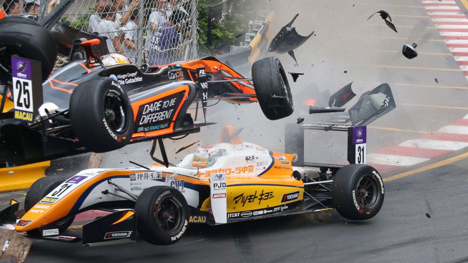 PHOTO: Van Amersfoort Racing's 17-year-old German racer Sophia Floersch's car, top, flying off the track at the Formula Three Macau Grand Prix in Macau, China, Nov. 18 2018.