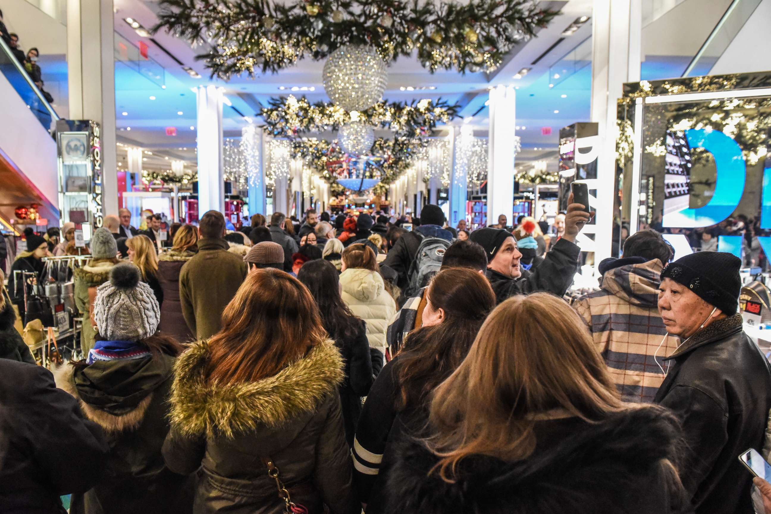 PHOTO: People enter Macy's department store to start shopping on "Black Friday" in New York City, Nov. 23, 2017. 