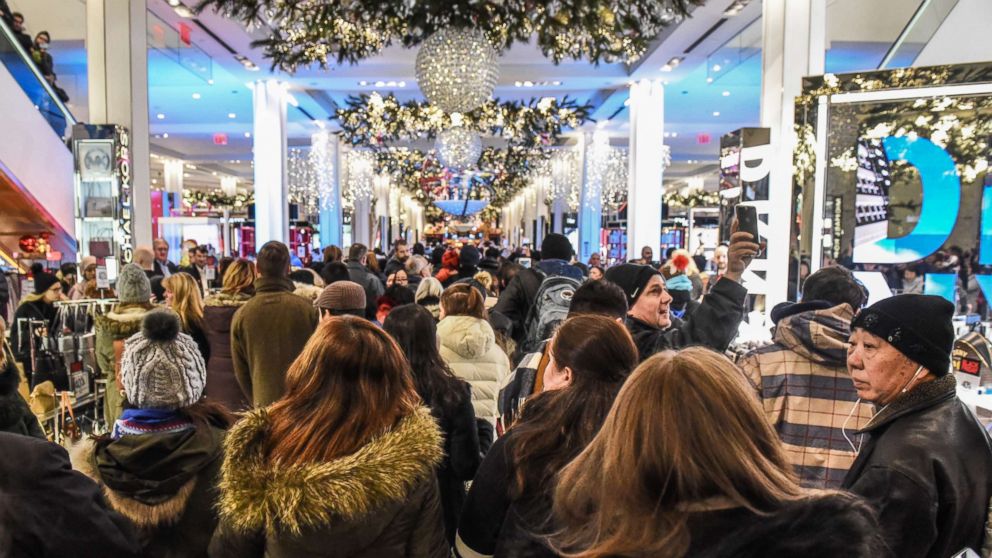 PHOTO: People enter Macy's department store to start shopping on "Black Friday" in New York City, Nov. 23, 2017. 