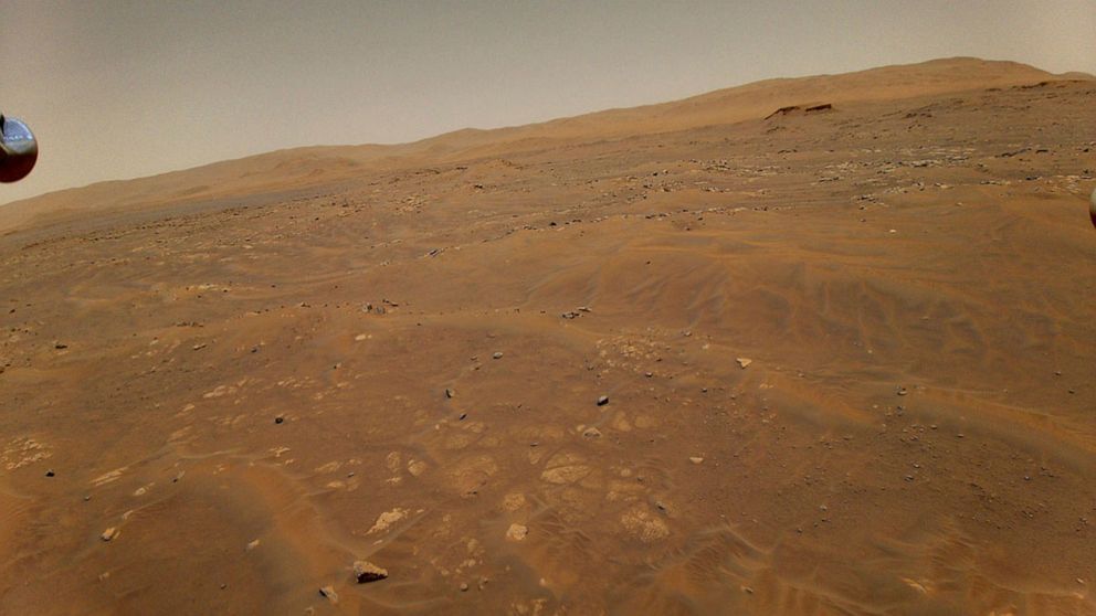 PHOTO: This May 22, 2021 photo made available by NASA shows the surface of Mars from a height of 33 feet  captured by the Ingenuity Mars helicopter during its sixth flight.