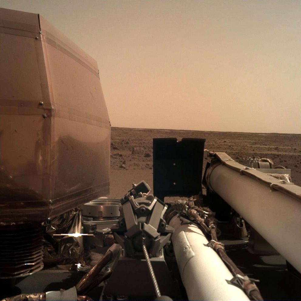 PHOTO: The NASA InSight took this photo of the surface of Mars using its robotic arm-mounted, Instrument Deployment Camera after touching down on the surface of the planet, Nov. 26, 2018.