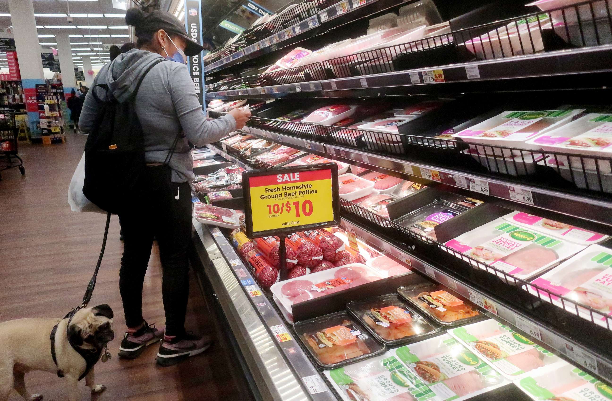 PHOTO: A person shops in the beef section of a supermarket on February 13, 2023 in Los Angeles.