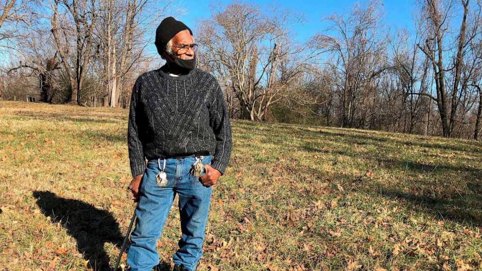 PHOTO: Clyde Robinson, 80, stands on his acre-sized parcel of land on Jan. 28, 2021, in Memphis, Tenn.