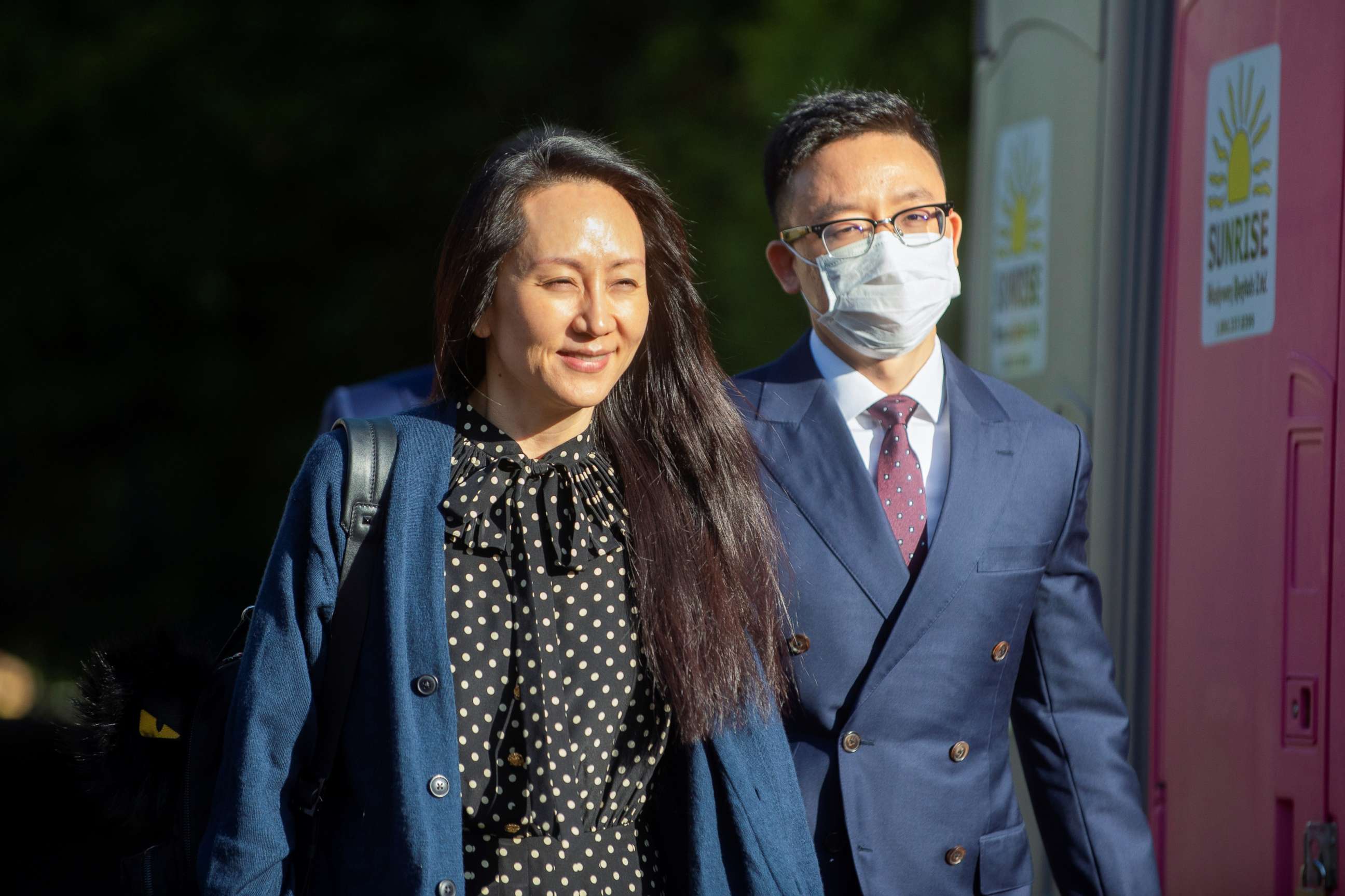 PHOTO: Huawei Technologies Chief Financial Officer Meng Wanzhou leaves her home to attend a court hearing in Vancouver, British Columbia, Canada, Sept. 24, 2021. 