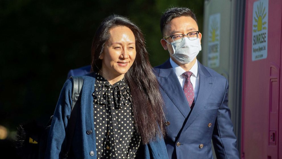 PHOTO: Huawei Technologies Chief Financial Officer Meng Wanzhou leaves her home to attend a court hearing in Vancouver, British Columbia, Canada, Sept. 24, 2021. 