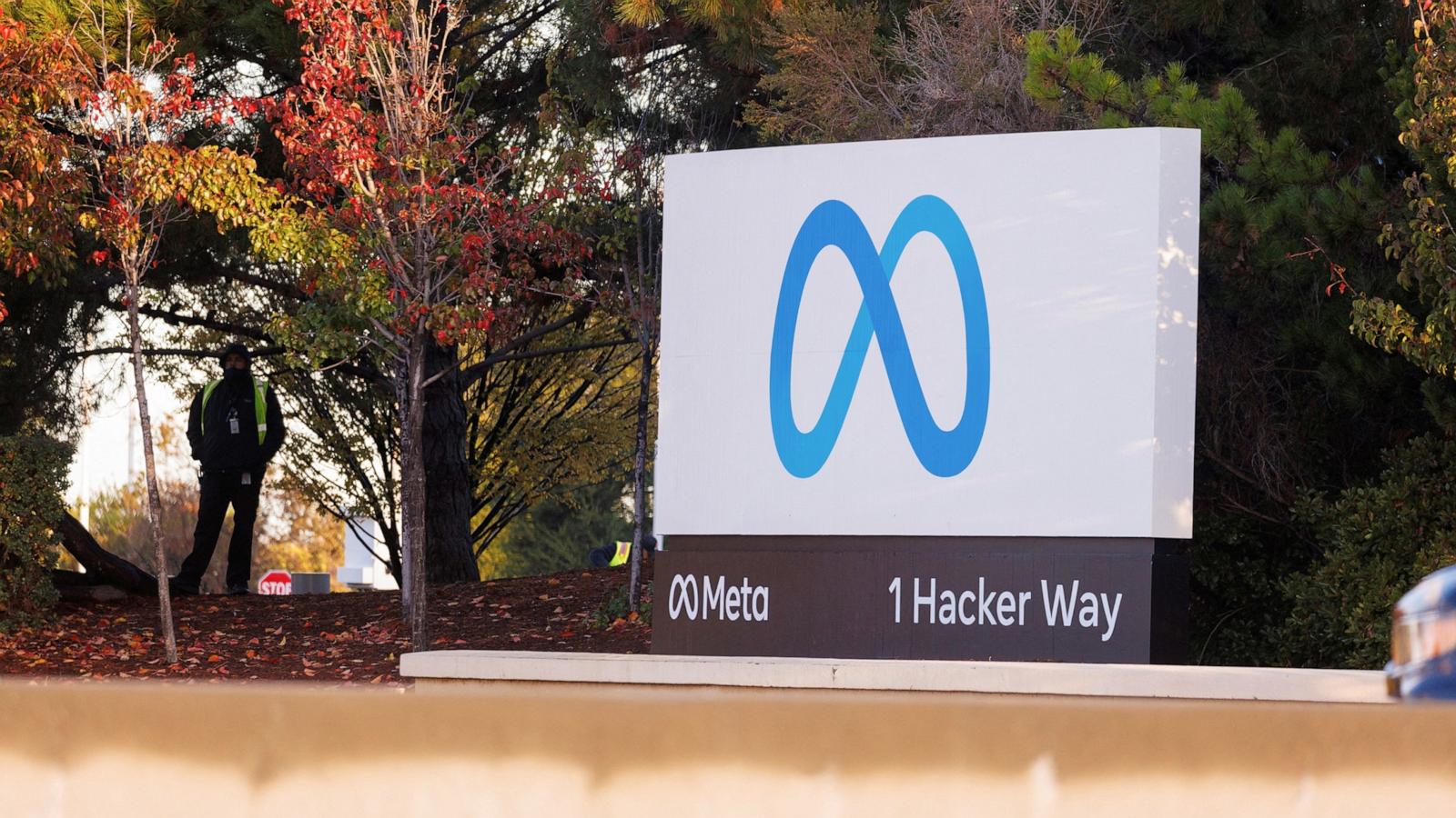 PHOTO: A security guard stands watch by the Meta sign outside the headquarters of Facebook parent company Meta Platforms Inc in Mountain View, California, November 9, 2022.
