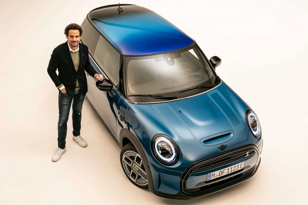 PHOTO: MINI's head of design, Oliver Heilmer, showing off the marque's new multitone roof.