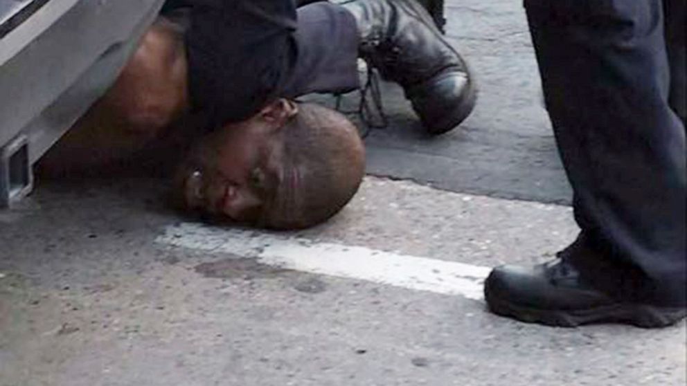 PHOTO: In an image made from video posted to Facebook, a Minneapolis police officer kneels on the neck of a man identified by a family attorney as George Floyd, May 25, 2020. Floyd died shortly after the incident.