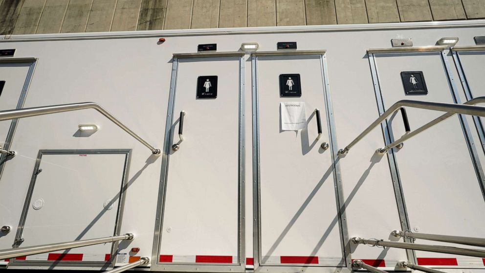 PHOTO: Multi stall portable toilets are are located on the Millsaps College campus to serve the remains 200 students that live in the dorms, in midtown Jackson, Miss., Sept. 1, 2022.