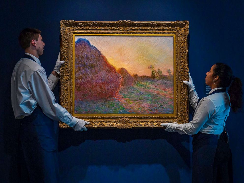 PHOTO: Claude Monets painting titled Meules is hung before being auctioned. The painting, one of Monets iconic paintings, fetched a record $110.7 million at an auction in New York, May 14, 2019.