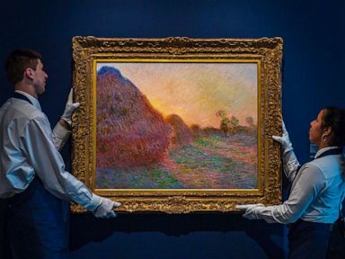 PHOTO: Claude Monets painting titled Meules is hung before being auctioned. The painting, one of Monets iconic paintings, fetched a record $110.7 million at an auction in New York, May 14, 2019.
