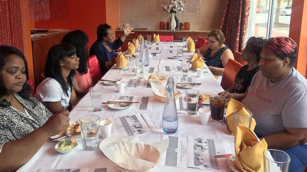 PHOTO: Girls Just Wanna Have Funds members discuss finances at a meeting in Washington, D.C.