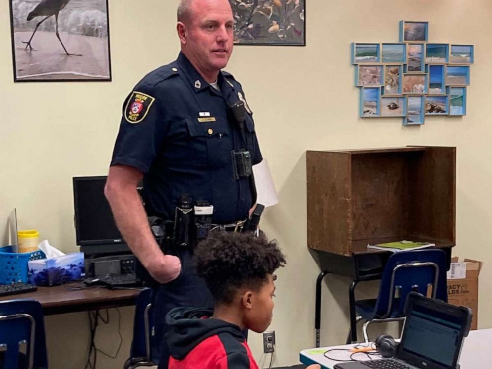 PHOTO: In this photo posted to the Moore Police Department's FaceBook account, officers helped out in the classrooms while the public schools in Moore, Okla., have been facing staffing shortages.