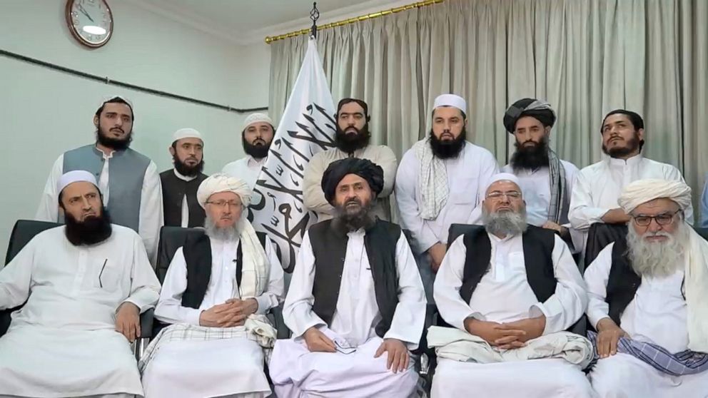 PHOTO: Mullah Baradar Akhund, a senior official of the Taliban, seated with a group of men, makes a video statement, in this still image taken from a video recorded in an unidentified location, supplied by a third party and released on Aug, 16, 2021.