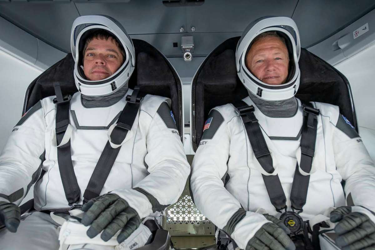 PHOTO: NASA astronauts Bob Behnken and Doug Hurley participate in a test of critical crew flight hardware on March 30, 2020, at a SpacerX processing facility on Cape Canaveral Air Force Station in Florida.