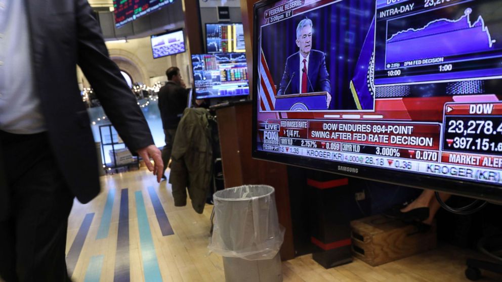 Traders work on the floor of the New York Stock Exchange as the Federal Reserve Board Chairman Jerome Powell holds a news conference on Dec. 19, 2018 in New York.