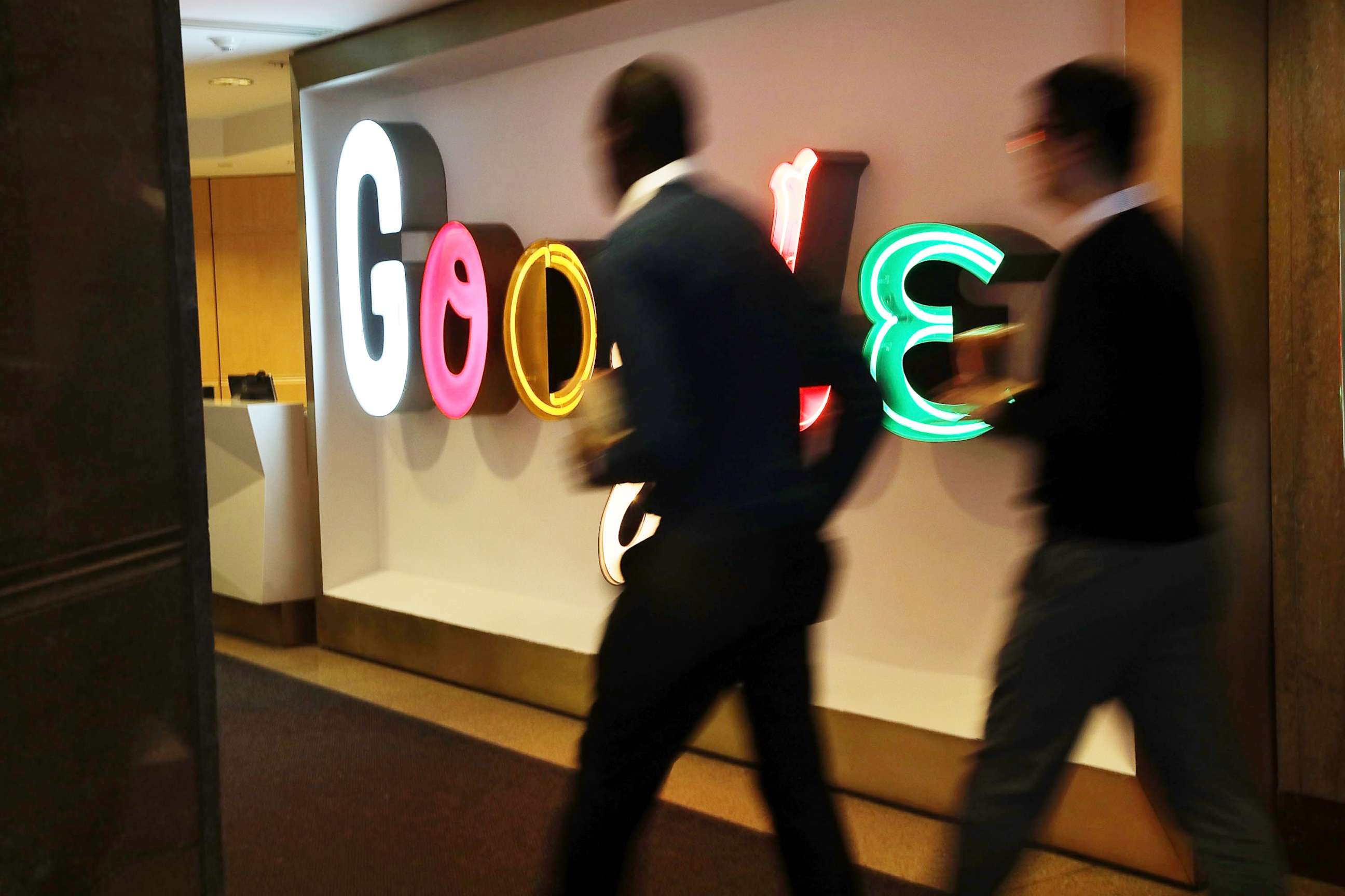 PHOTO: People walk into Google's New York offices on March 5, 2018. 