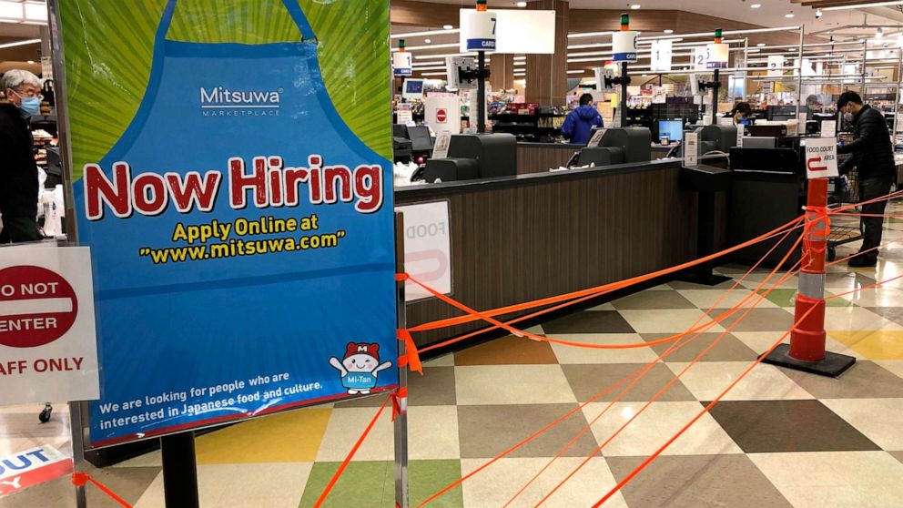 PHOTO: A "Now hiring" sign is displayed at a grocery store in Arlington Heights, Ill., Nov. 13, 2020, during the coronavirus pandemic.