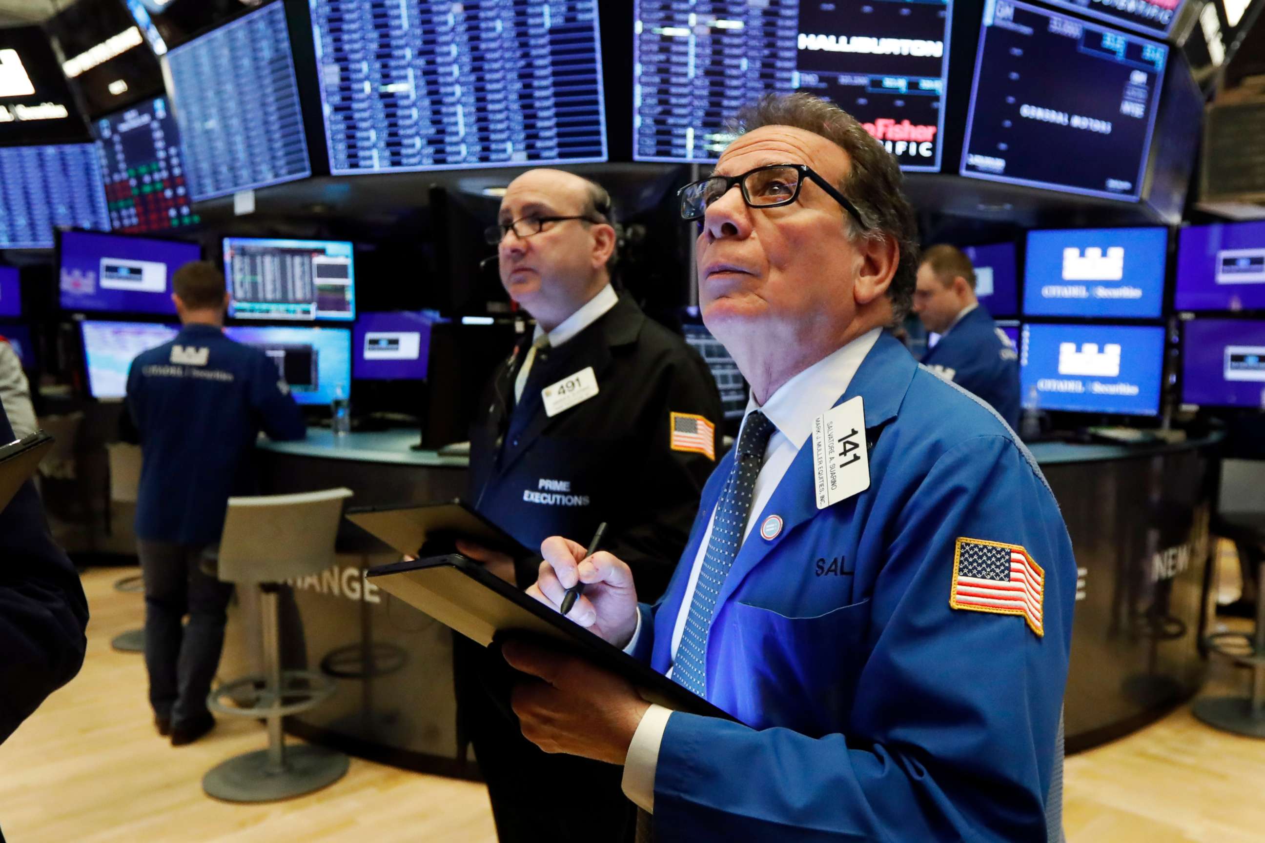 PHOTO: Traders work on the floor of the New York Stock Exchange, Feb. 25, 2020.