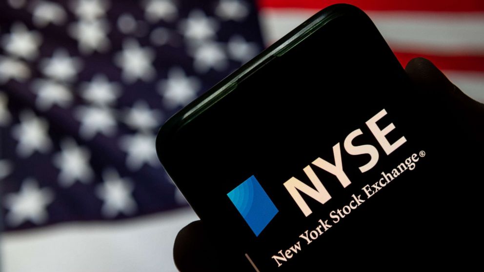 PHOTO: New York Stock Exchange logo is seen on a mobile device.