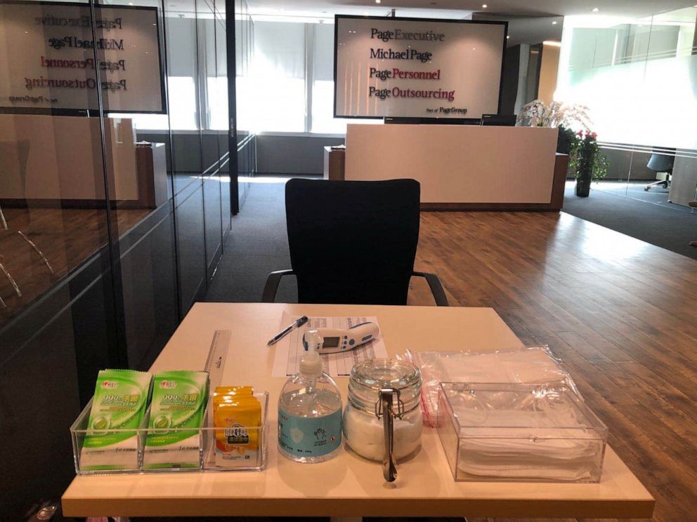 PHOTO: A thermometer, hand sanitizer and masks are pictured in the reception area at PageGroup's office after reopening, as the coronavirus disease continues, in Shanghai, China, April 29, 2020.