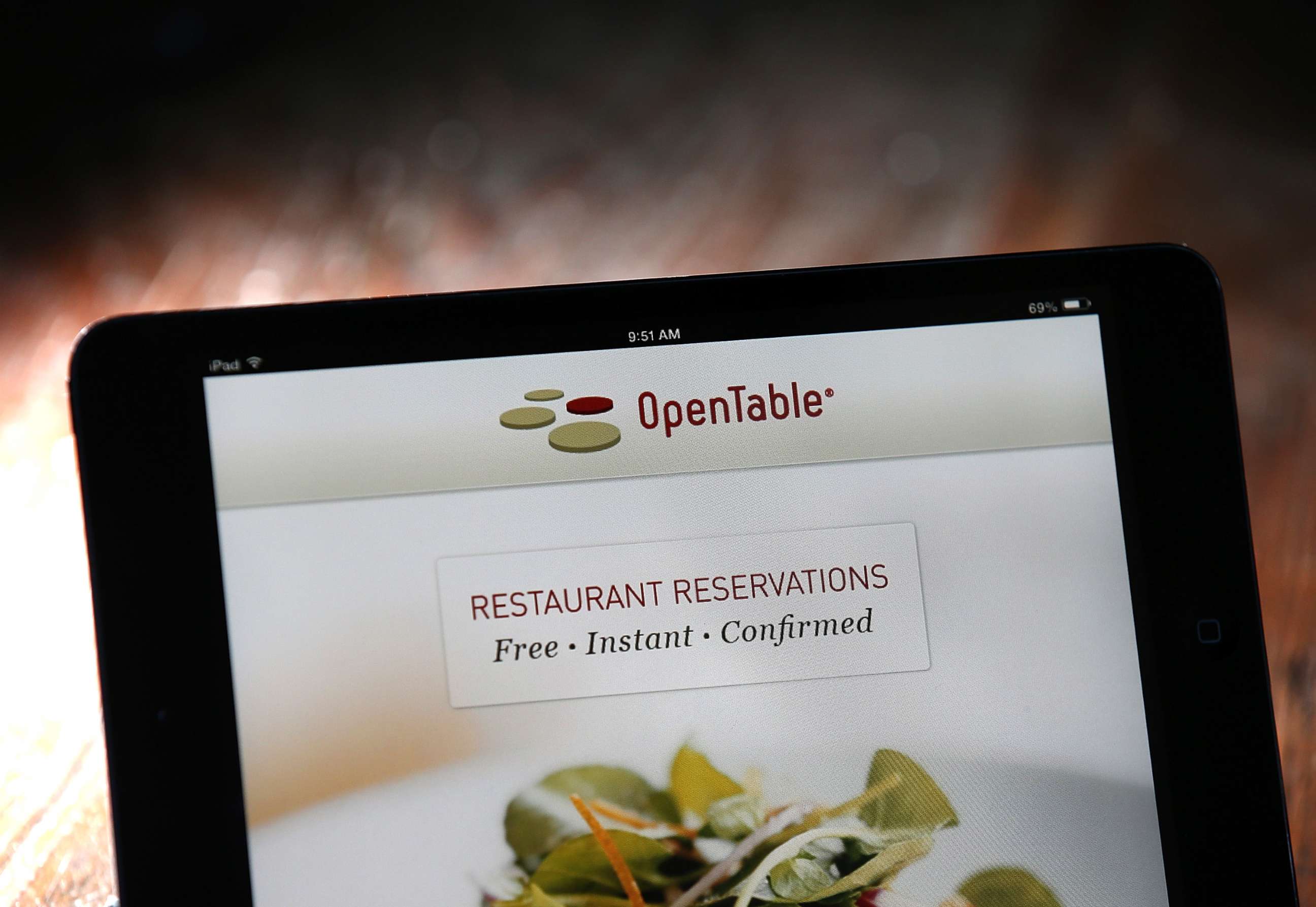 PHOTO: The OpenTable website is displayed on mobile device on June 13, 2014 in San Anselmo, Calif.
