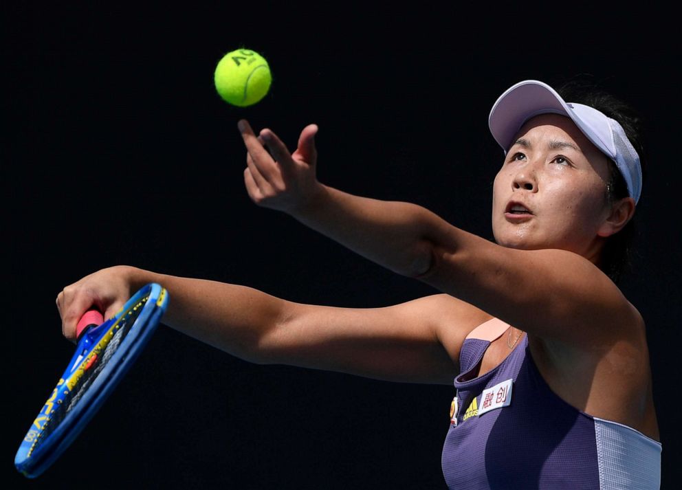 PHOTO: China's Peng Shuai serves to Japan's Nao Hibino during their first round singles match at the Australian Open tennis championship in Melbourne, Australia, Jan. 21, 2020.
