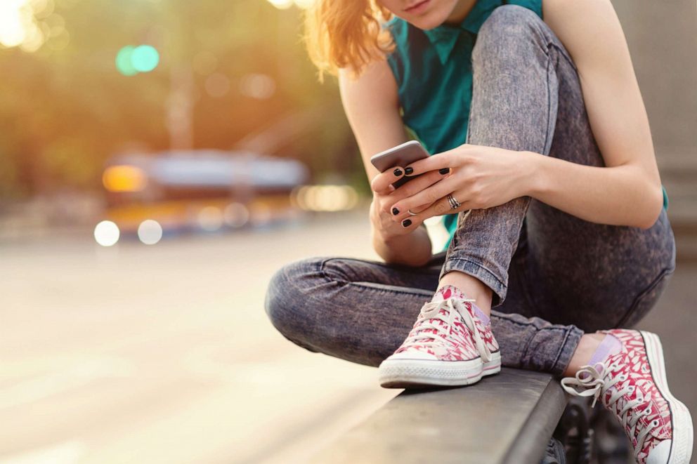 PHOTO: A teen on a phone in an undated stock photo.