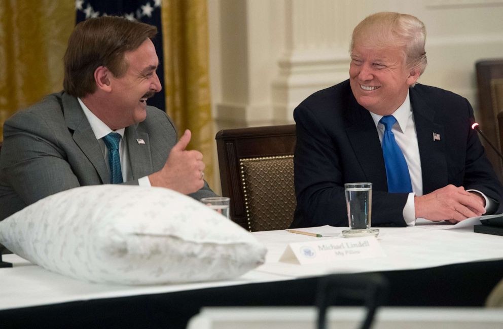 PHOTO: President Donald Trump speaks alongside Mike Lindell (L), founder of My Pillow, during a Made in America event with US manufacturers in the East Room of the White House, July 19, 2017.