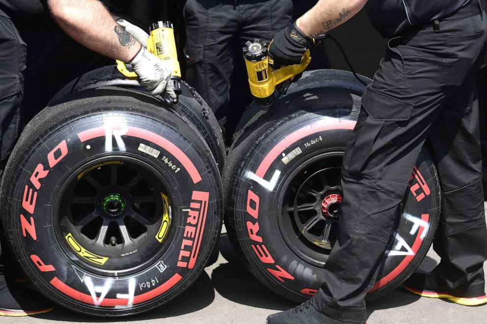PHOTO: Pirelli mechanics prepare tires during the first practice session at Hermanos Rodriguez racetrack in Mexico City, on Nov. 5, 2021, ahead of the Formula One Mexico Grand Prix.