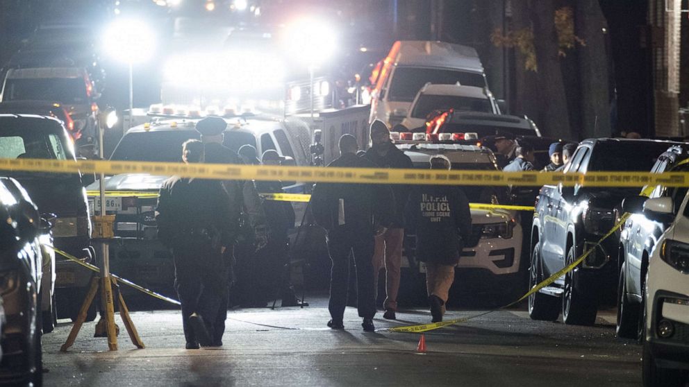 PHOTO: Police tape surrounds the area in the Bronx where two police officers were shot, on Nov. 24, 2021.