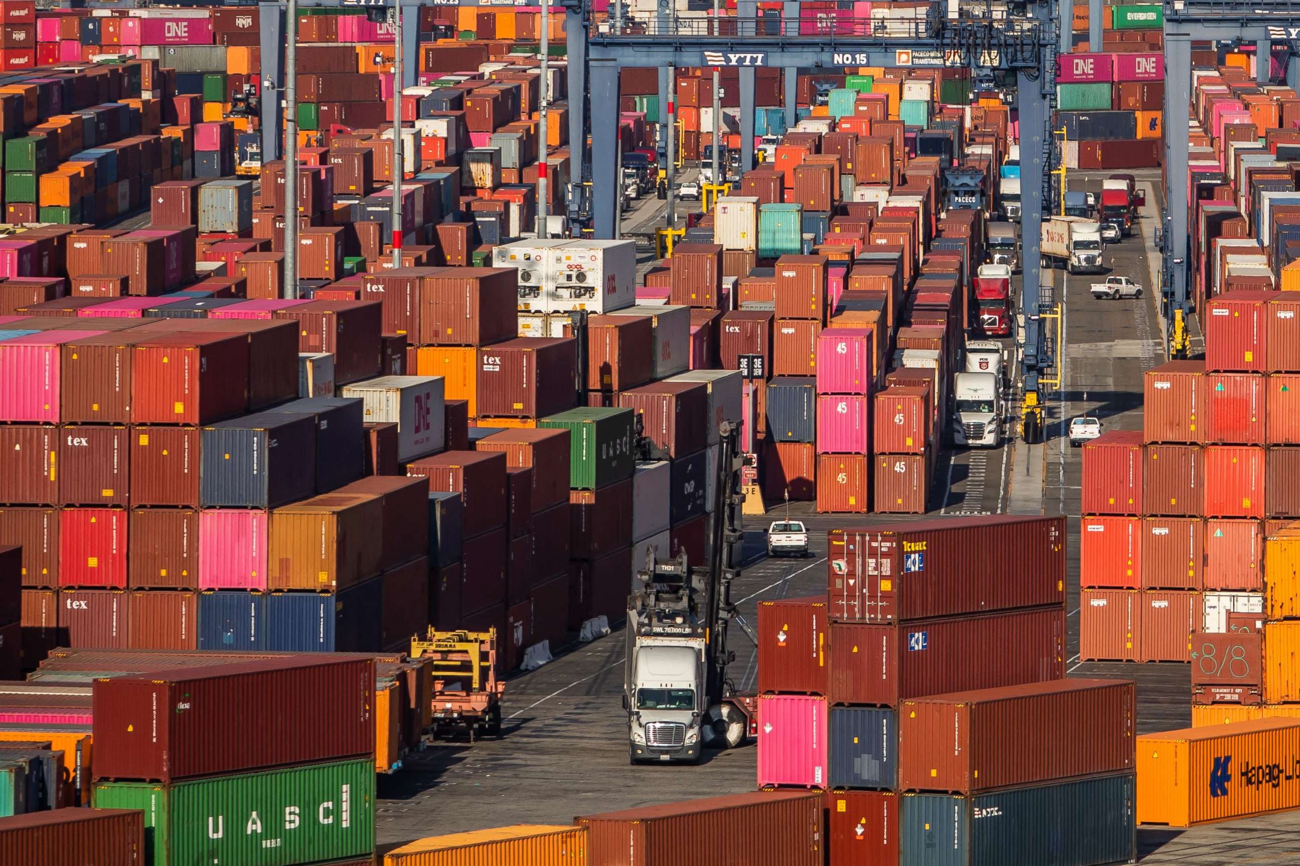 PHOTO: Shipping containers and trucks are seen inside the Port of Los Angeles in San Pedro, Calif., Nov. 17, 2021.