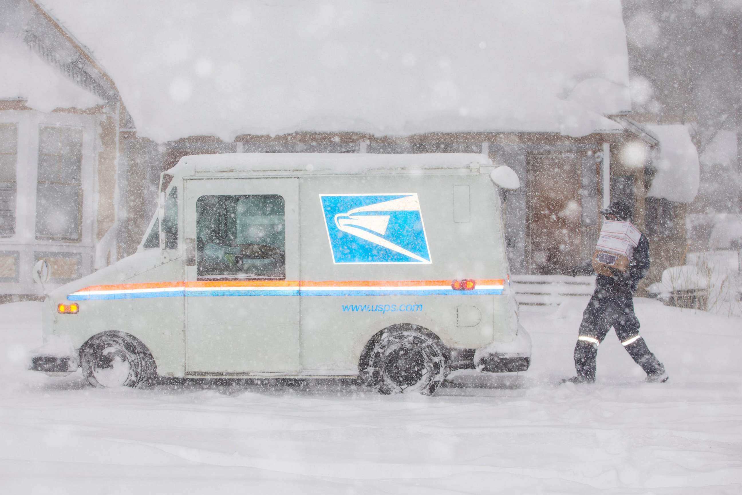 PHOTO: A United States Postal Service worker delivers mail in the snow in Flagstaff on Jan. 25, 2021.

Jan 25 2021 Flagstaff Snow Day