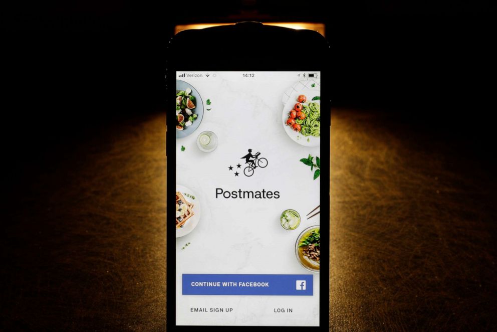 PHOTO: This Tuesday, Feb. 20, 2018, photo shows the Postmates app on an iPhone in Chicago.