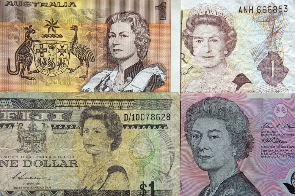 PHOTO: PPortraits of Queen Elizabeth on old one dollar ($1) paper banknotes of Australia, New Zealand and Fiji and on the current five dollar ($5) polymer banknote of Australia.