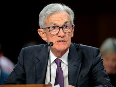 Fed holds its benchmark interest rate steady