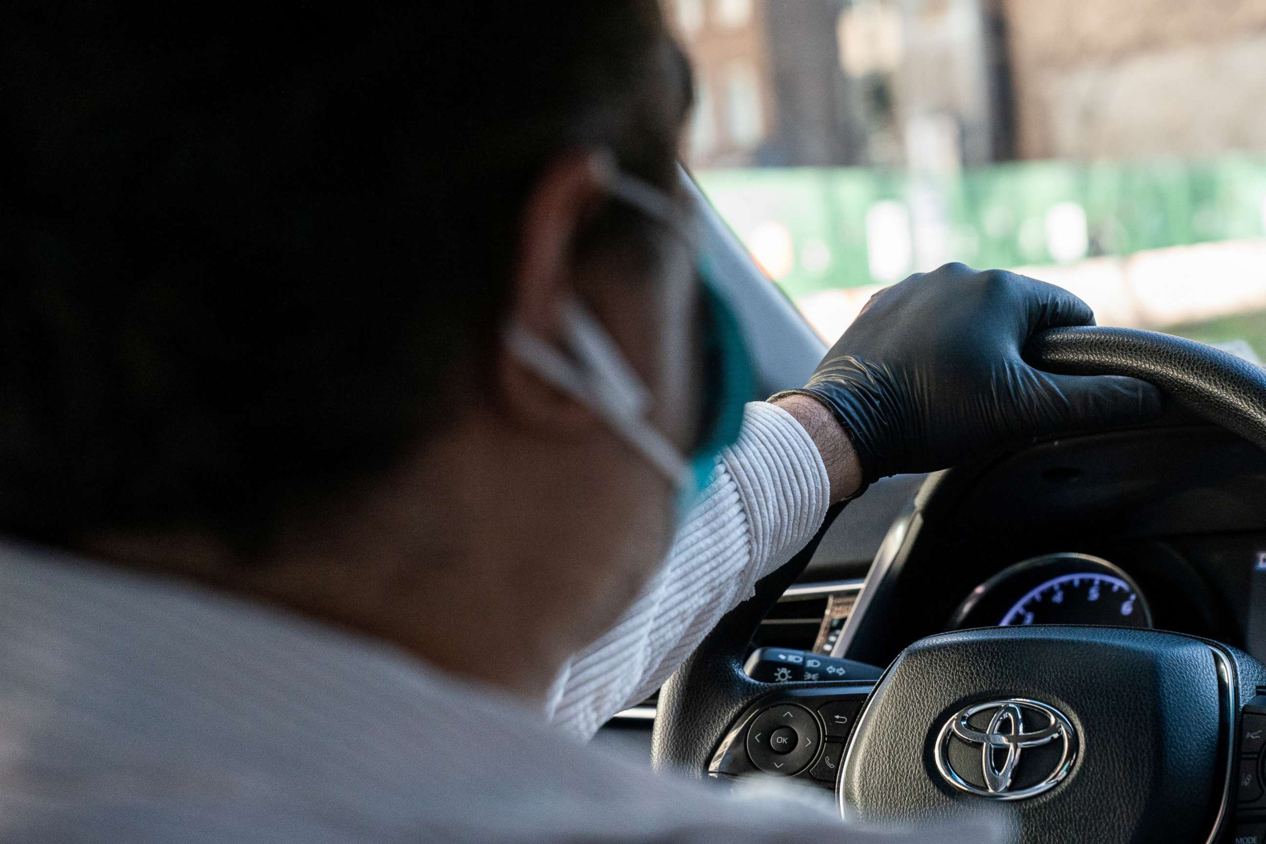 PHOTO: An Uber driver wearing a protective glove is seen in the Manhattan borough, following the outbreak of coronavirus disease (COVID-19), in New York City, March 15, 2020.