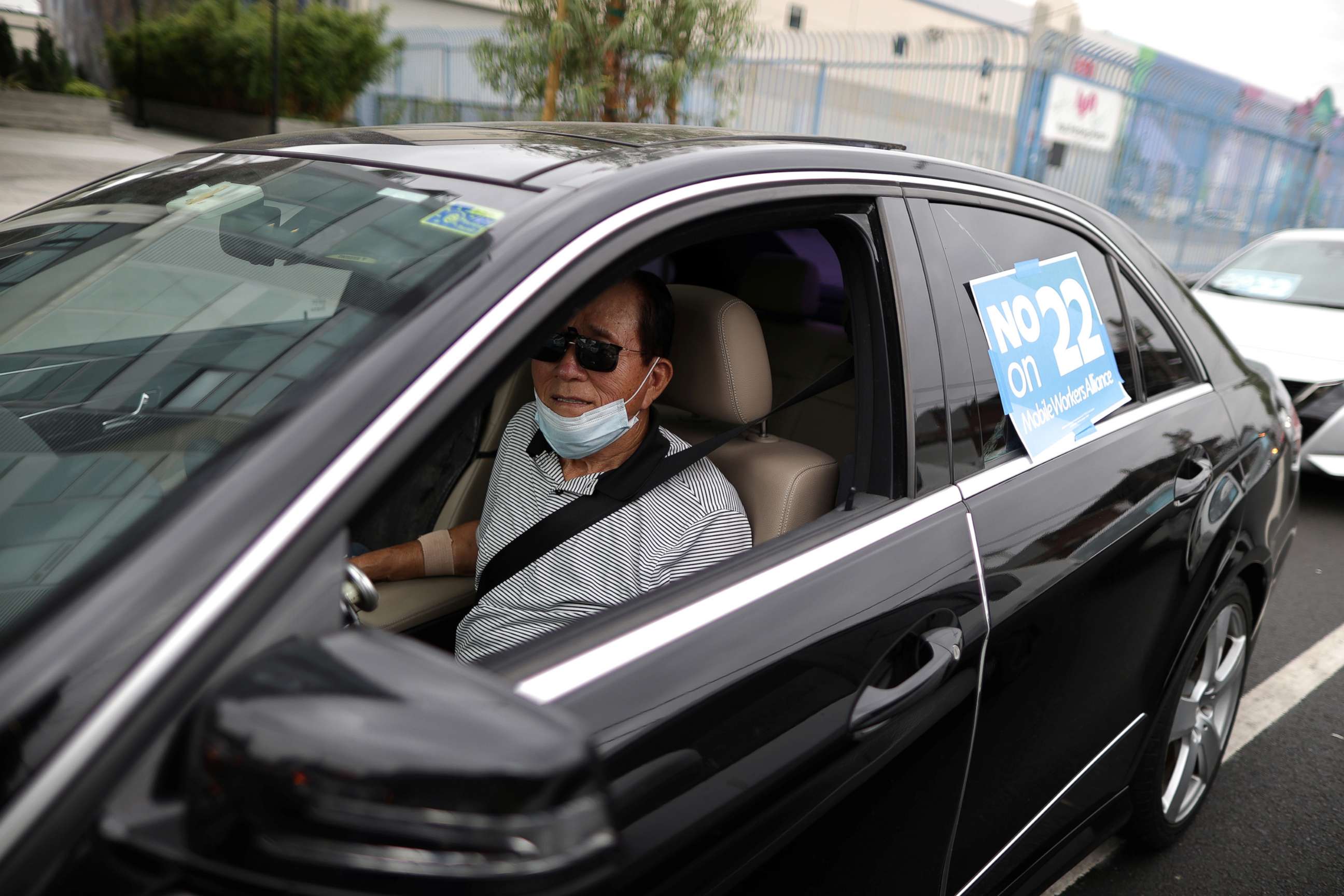 PHOTO: Rideshare driver Peter Hong, 67, joins a car caravan at a protest by Uber and Lyft drivers against the upcoming California Proposition 22 ballot measure, in Los Angeles, Aug. 6, 2020.