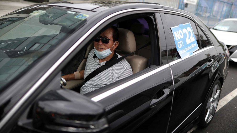 PHOTO: Rideshare driver Peter Hong, 67, joins a car caravan at a protest by Uber and Lyft drivers against the upcoming California Proposition 22 ballot measure, in Los Angeles, Aug. 6, 2020.