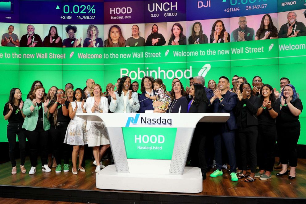 PHOTO: Baiju Bhatt and Vlad Tenev celebrate after ringing the bell on Robinhood Markets IPO Listing Day, July 29, 2021, in New York City.