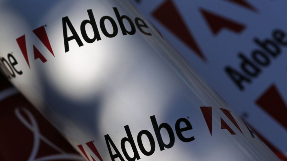 Adobe company logos are seen in this July 9, 2013 picture illustration.