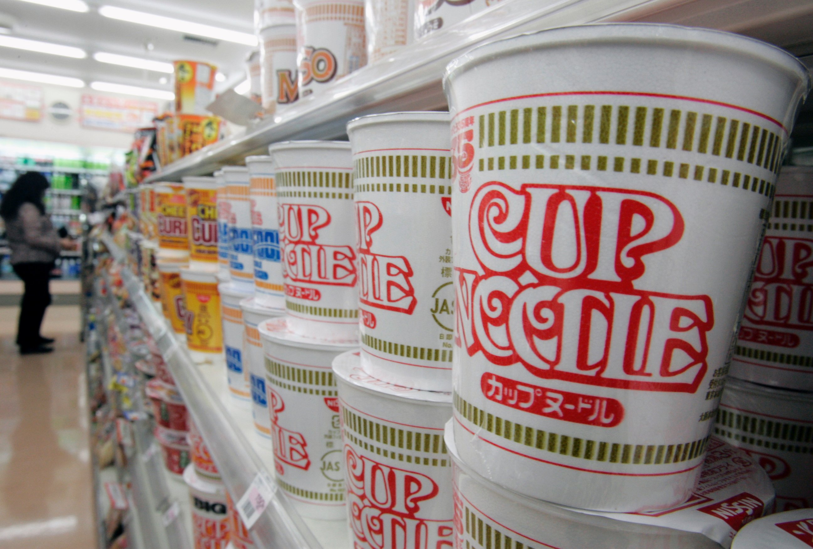 PHOTO: Japanese instant-noodle maker Nissin Food Products' "Cup Noodle" are stacked at a convenience store in Tokyo on Nov. 15, 2006.