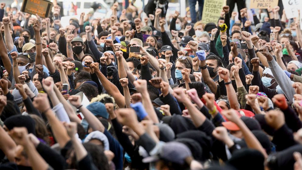 PHOTO: Demonstrators raise their fists during a rally in San Francisco, May 31, 2020, while protesting the death of George Floyd.