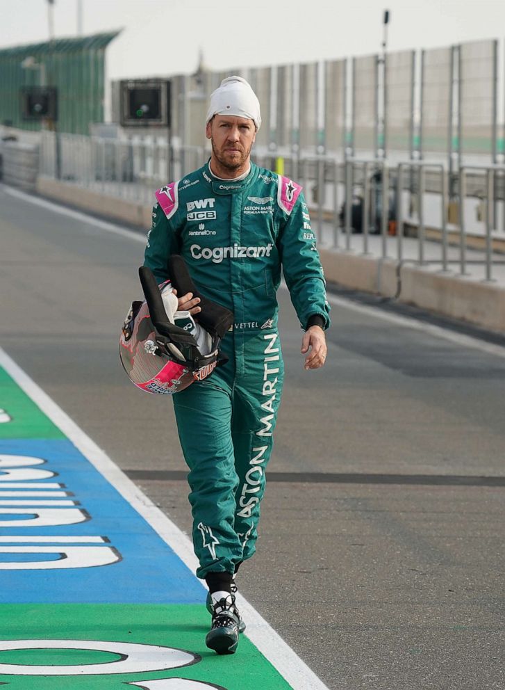 PHOTO: Sebastian Vettel of Team Aston Martin, Germany, walks down the pit lane during the Qatar Grand Prix at the Losail International Circuit in Doha, Qatar, Nov. 20, 2021.