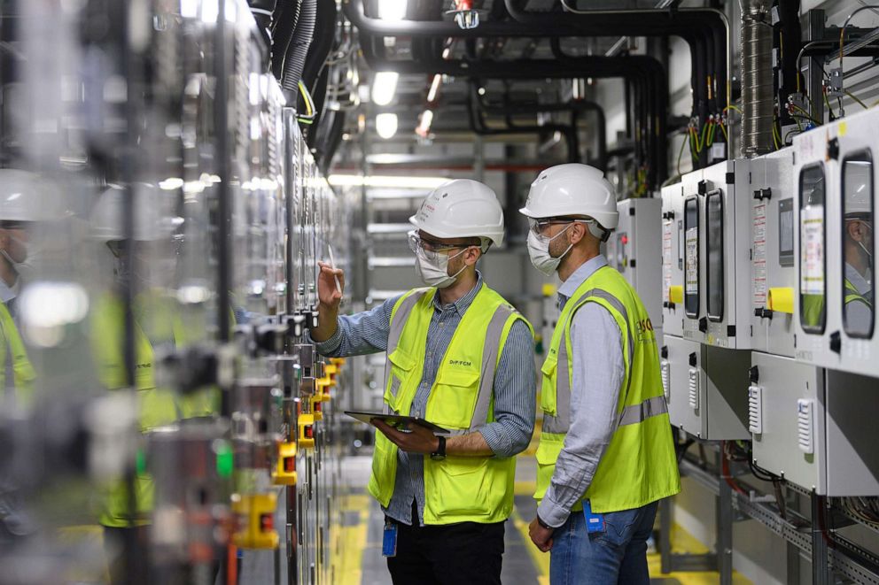 PHOTO: Associates check construction during a press tour of Bosch's new semiconductor factory in Dresden, Germany, May 31, 2021. 