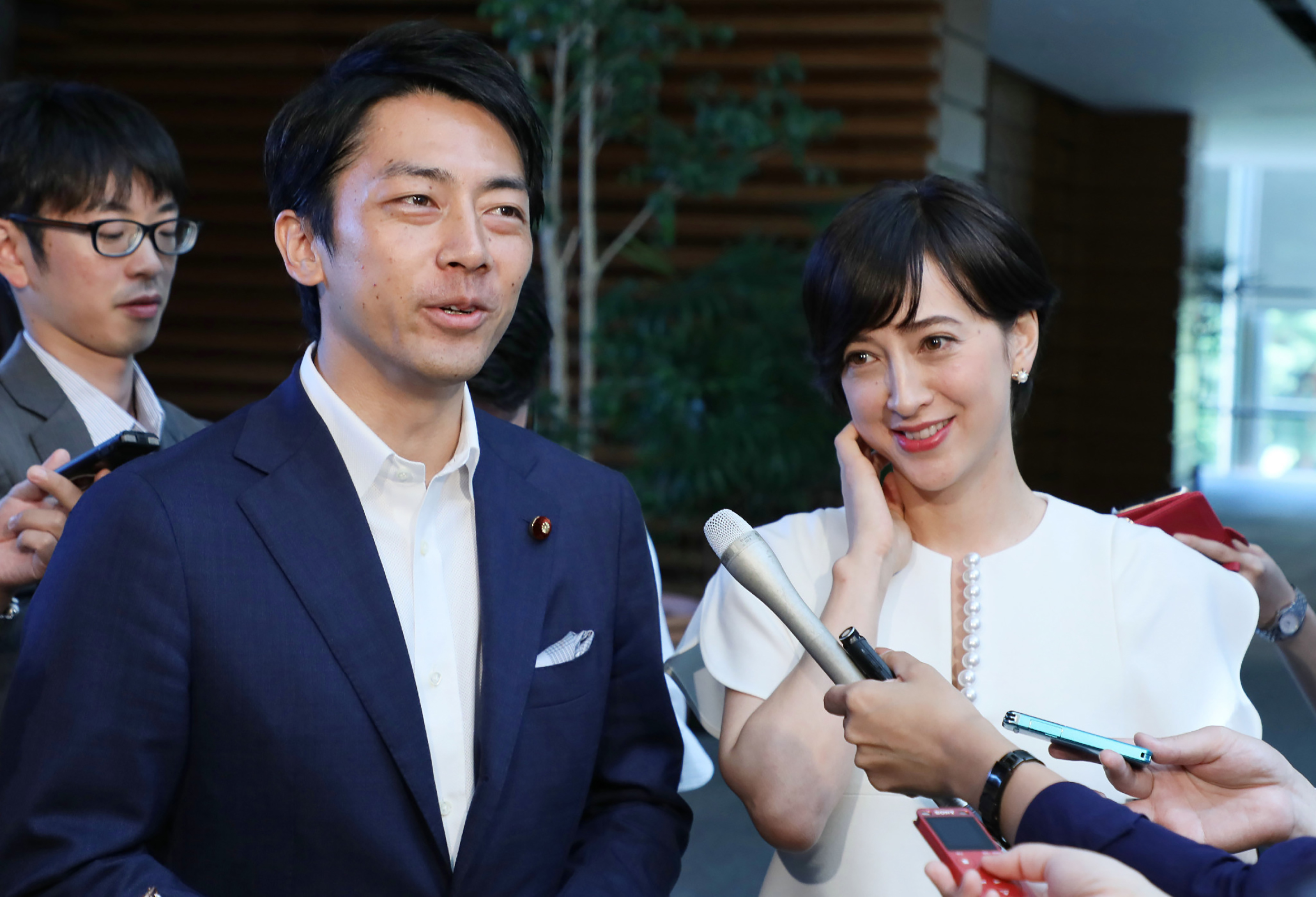  This Aug. 7, 2019 file picture shows Japan's Environment Minister Shinjiro Koizumi and his wife, television anchorwoman Christel Takigawa, in Tokyo. On Jan. 15, 2020, Koizumi said he would take paternity leave, the first by a serving cabinet minister.