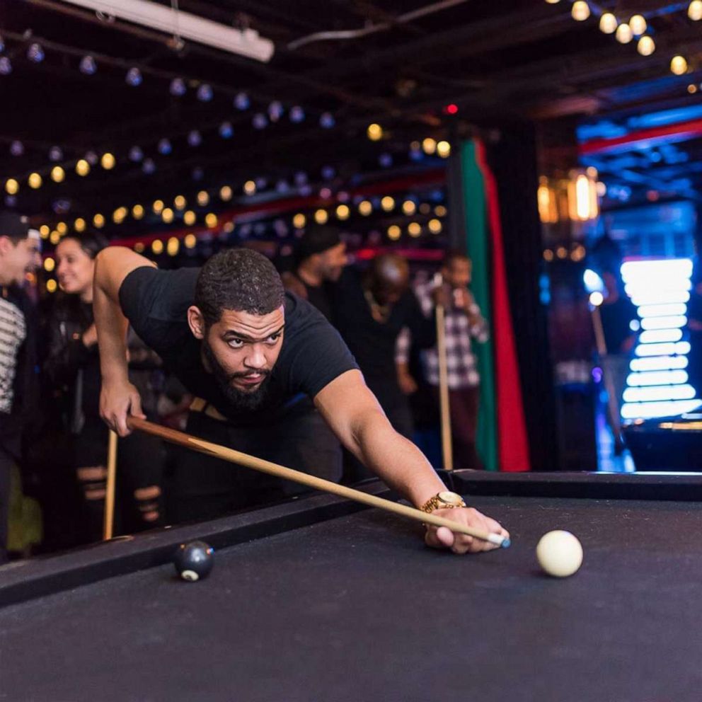 PHOTO: A gust plays pool at Slate in New York City in an undated photo, before the coronavirus pandemic. 